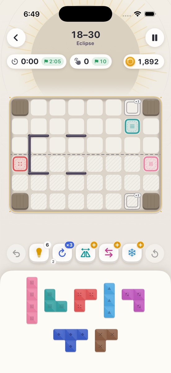 Level 18-30 in Eclipse: a symmetric board with a dashed mirror axis, thin walls and ×2 cells, above a tray of pieces.