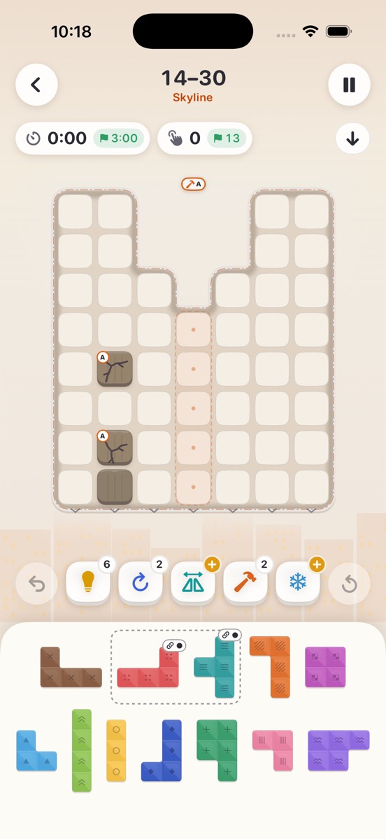 Level 14-30 in Skyline: a city-shaped board where pieces fall under gravity, with the tray of pieces below.